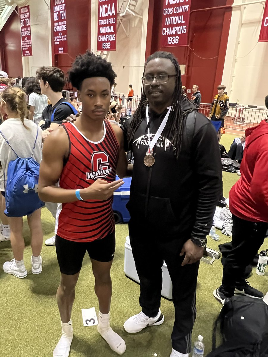 TJ Caldwell and Coach Caldwell “Dad” after his 3rd place finish in long jump at indoor state today