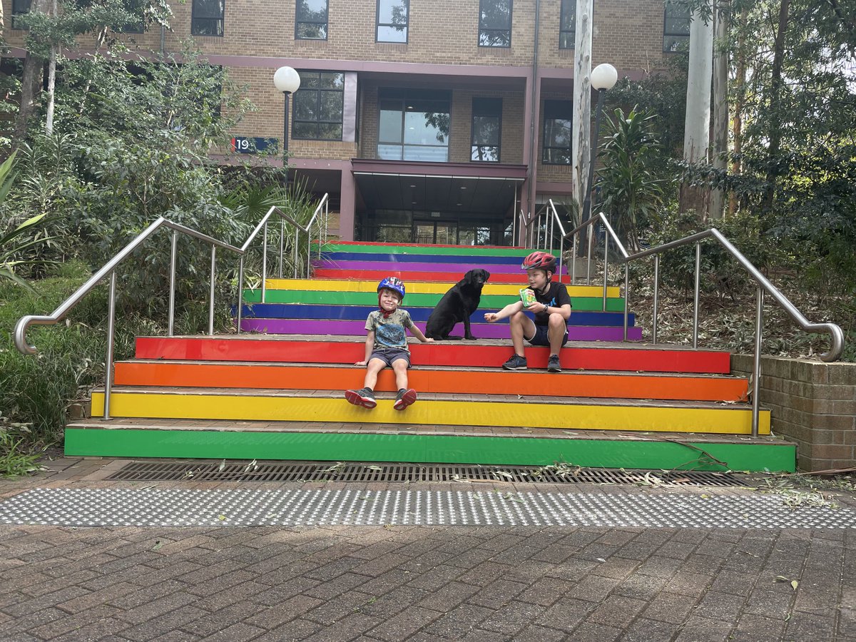 My family having fun on the rainbow steps ⁦<a href="/UOW/">UOW</a>⁩. I’ve walked up these steps many times and felt happy to have a welcoming and inclusive employer.