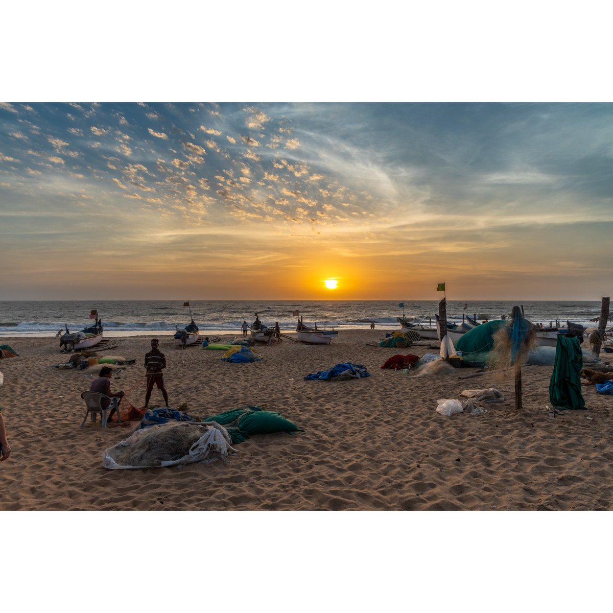Fishermen fix their nets while watching the beautiful sunset. It's a final goodnight from #goa, thank you for some wonderful memories #india