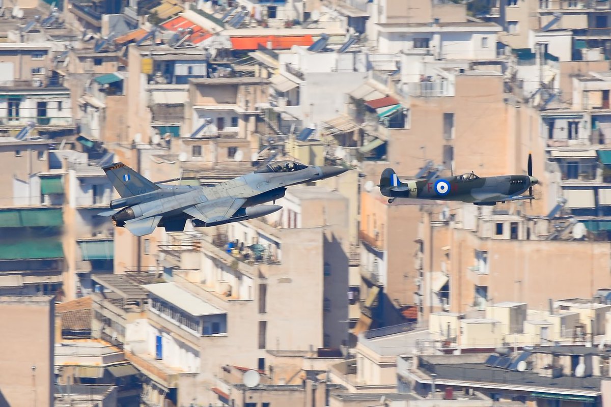 Formation #F-16C of #335Sqn 🐯 &amp; Spitfire MJ755 over the city of #Athens..

#athens #haf #25η_Μαρτιου #aviation #avgeek
