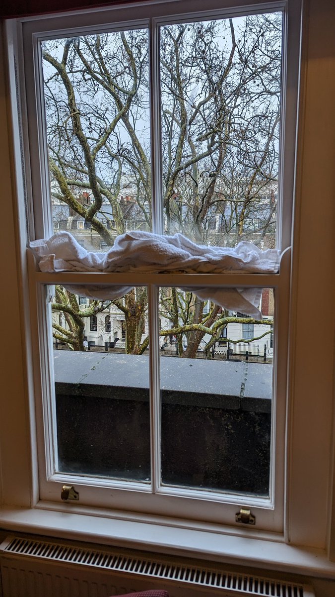DuncanHolmesVOG's tweet photo. So if leaving towels on the floor means they need changing, what does it mean when housekeeping stuff one into the gap between windows? @DaysInnHydePark @daysinn Surely just fixing it would be more environmentally friendly? https://t.co/y7VygEG5tt