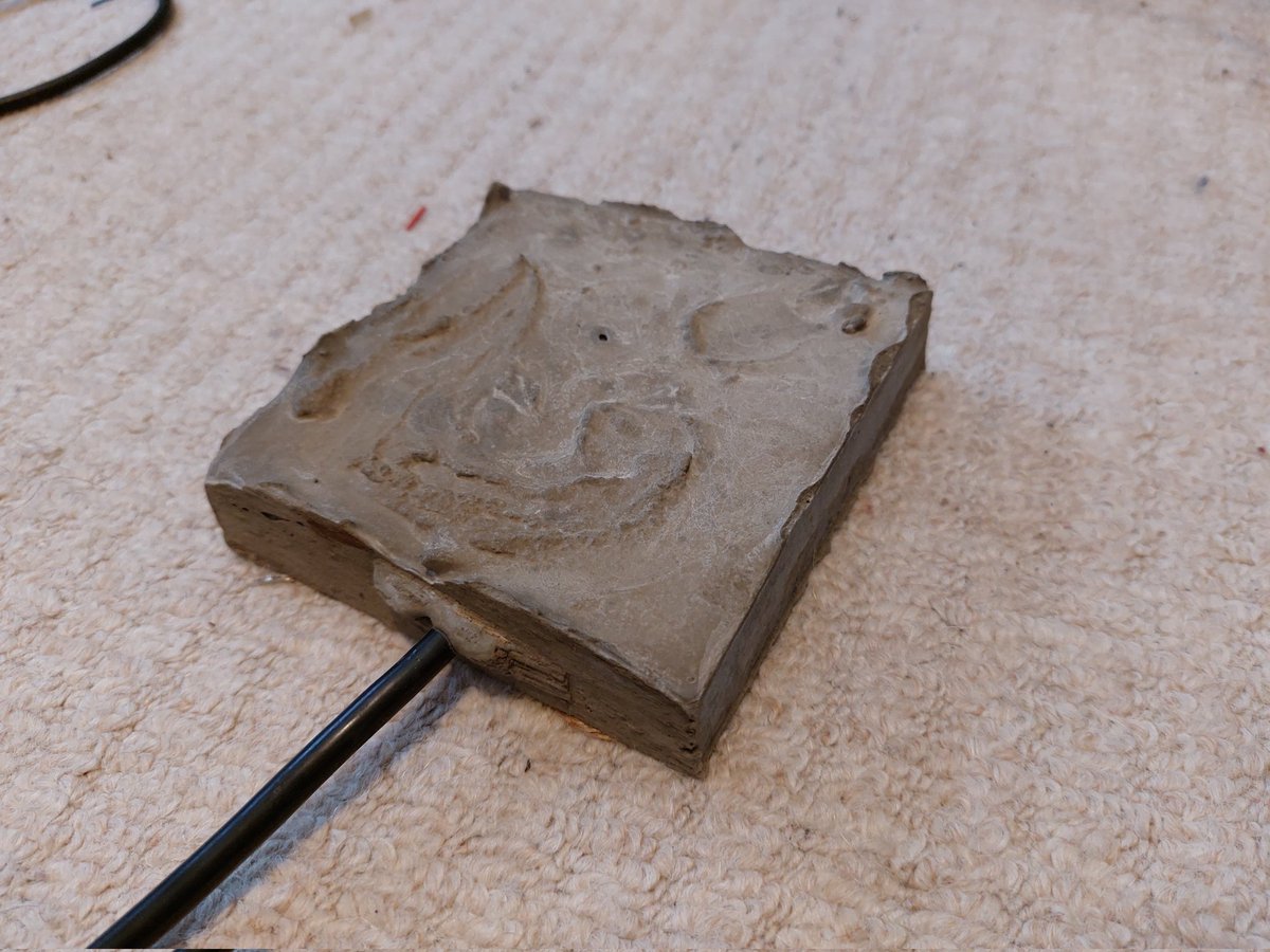 Contact mic casted in cement. Perfect for dragging across the floor and as a door stop!