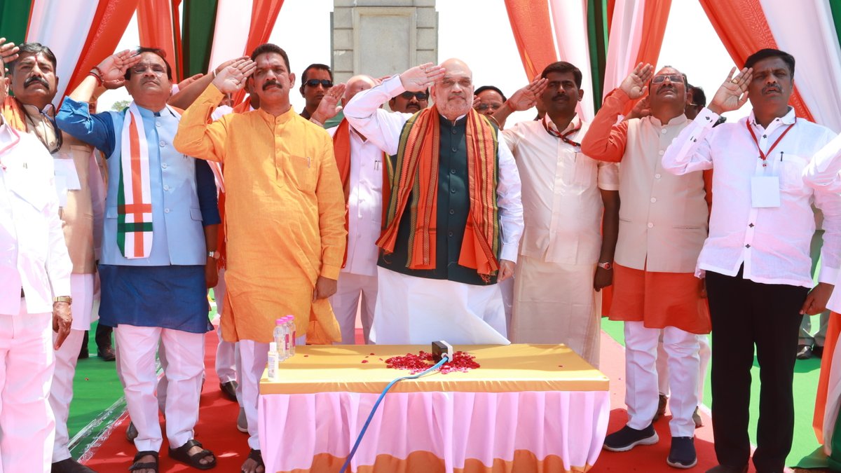 AmitShah's tweet photo. Proudly unfurled a 103-feet-tall Tricolor at Gorata village in Karnataka.

In 1948, hundreds of people were killed brutally for hoisting the Indian flag against the wishes of the Nizam of Hyderabad.

Their legacy of heroism will thrive for good. https://t.co/FenCS1RR1D