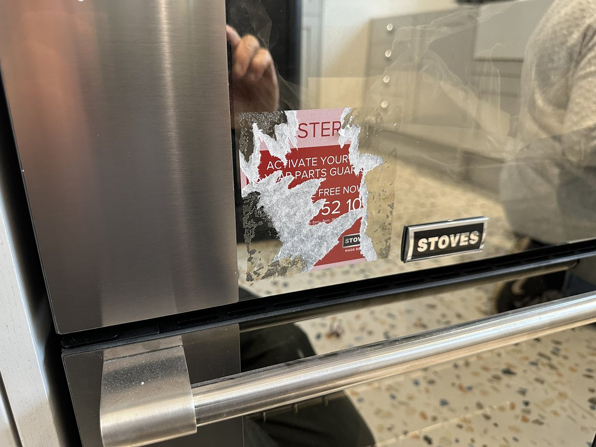 DavidRMitchell's tweet photo. @StovesUK why do you put a sticker on a new range cooker that doesn’t peal off easily? Stupidity at its best. https://t.co/x5lBfG4C5T