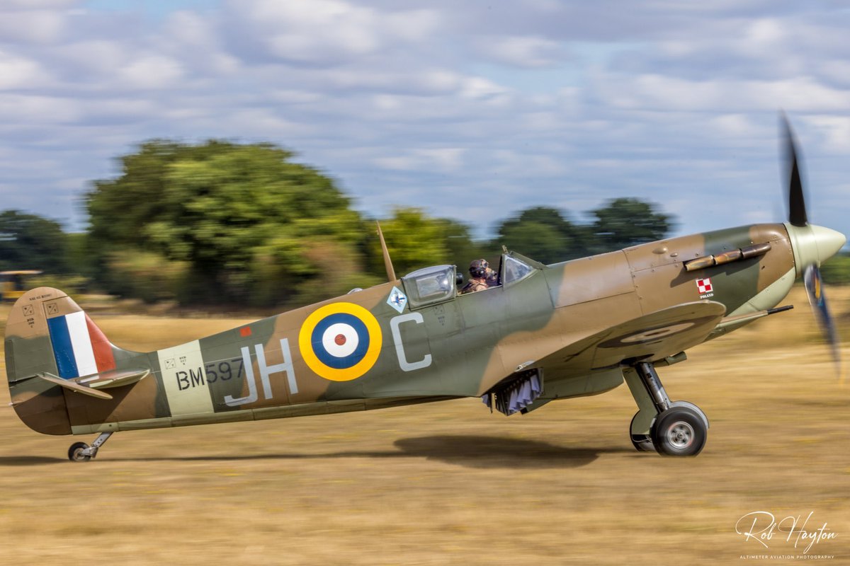 ShutterbugWGC's tweet photo. “Spitfire Week”
Clive Denney in the HAC/PHF Mk. Vb BM597 as he taxis in shortly after landing at Fullers Hill Farm prior to the Little Gransden Air & Car Show in August 2022…@FlightPolish @SocietySpitfire #Spitfire #RJMitchell #MerlinEngines #AvGeek #AviationPic https://t.co/wmyvMXlqWl