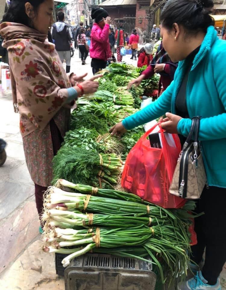 Who is a fan of green leafy vegetables? #vegetablemarket in Kathmandu, a variety of fresh #greens neatly tied in small bundles with the help of dried straws (paral) displayed in such a delightful way. you will find #mustard #spinach, fenugreek leaves, #gardencress…