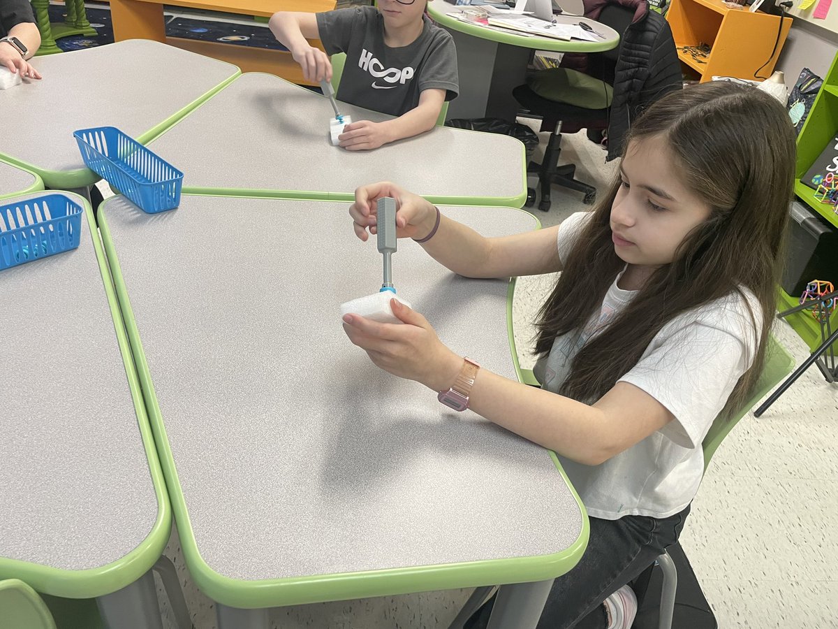 AmandaStrickler's tweet photo. 3rd graders are experimenting with and building simple machines. They are using the VEX robotics kits to solve a problem. Can they lift a toy tiger 🐅 from a chair up onto the table with a compound machine they build? #PLTW #STEM #BHWarriorPride @Bighollowelem https://t.co/Cua1wFL44d