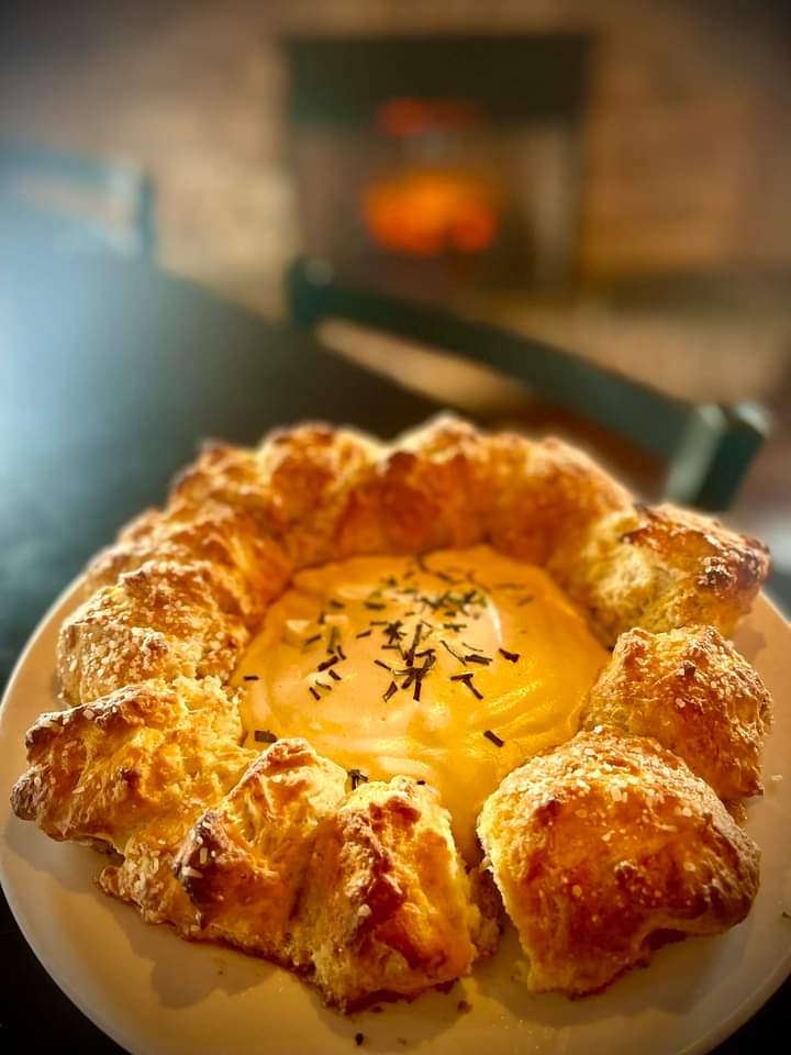 ChefAussie2022's tweet image. House made pretzel ring centered with Jefferson Roadhouse beer cheese