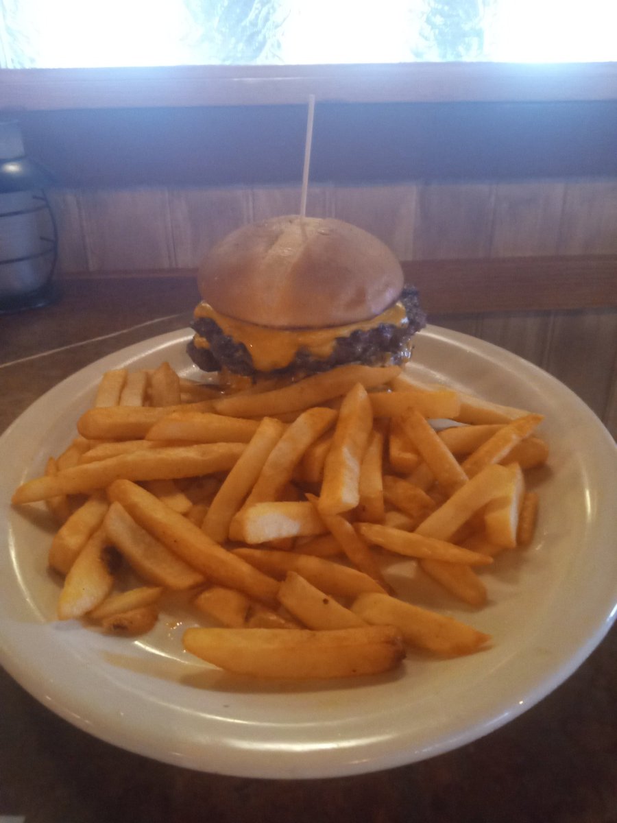 ChefAussie2022's tweet image. Double cheeseburger and fries. 2 -1/2 pound beef patties topped with cheddar cheese served on a toasted brioche bun with golden fries