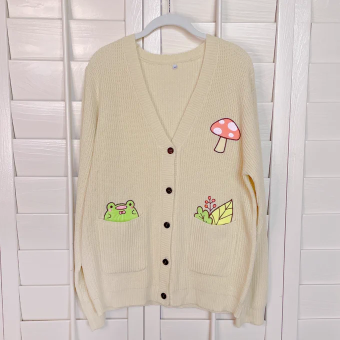 ok but how badly do y'all want a frog cottagecore sweater  