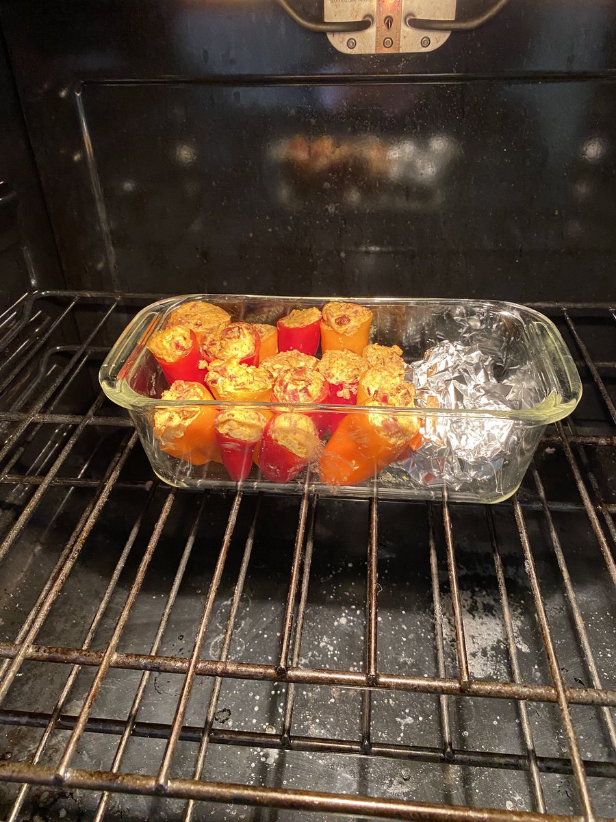 In the oven…. #stuffedpeppers