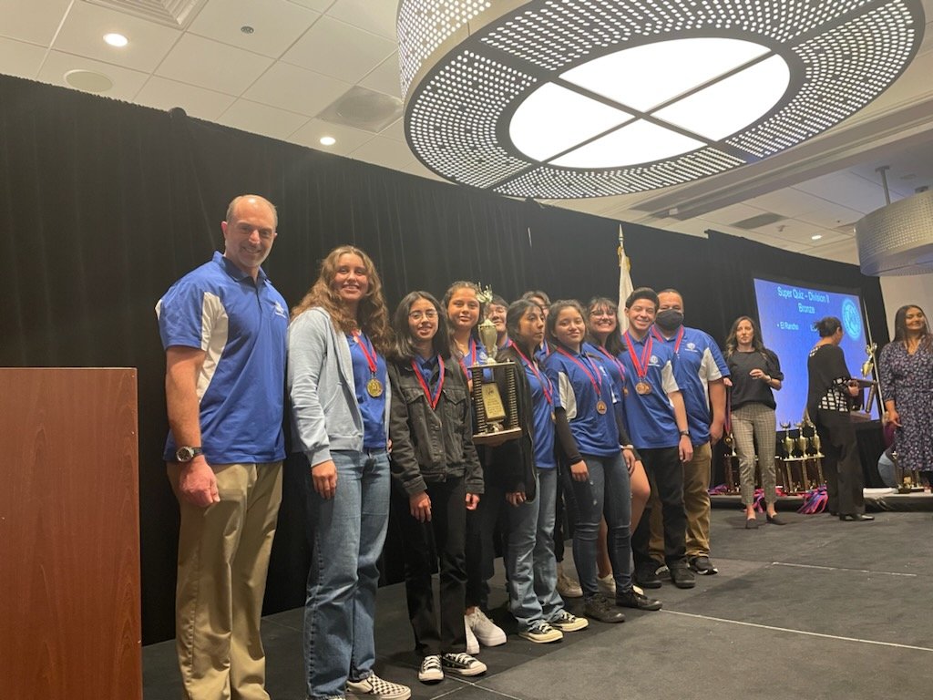 SFrancismath's tweet photo. The @ElRanchoHS Academic Decathlon team is bringing home a trophy! 3rd place in Super Quiz! @cmelgarmath https://t.co/lnLE1mI5Va