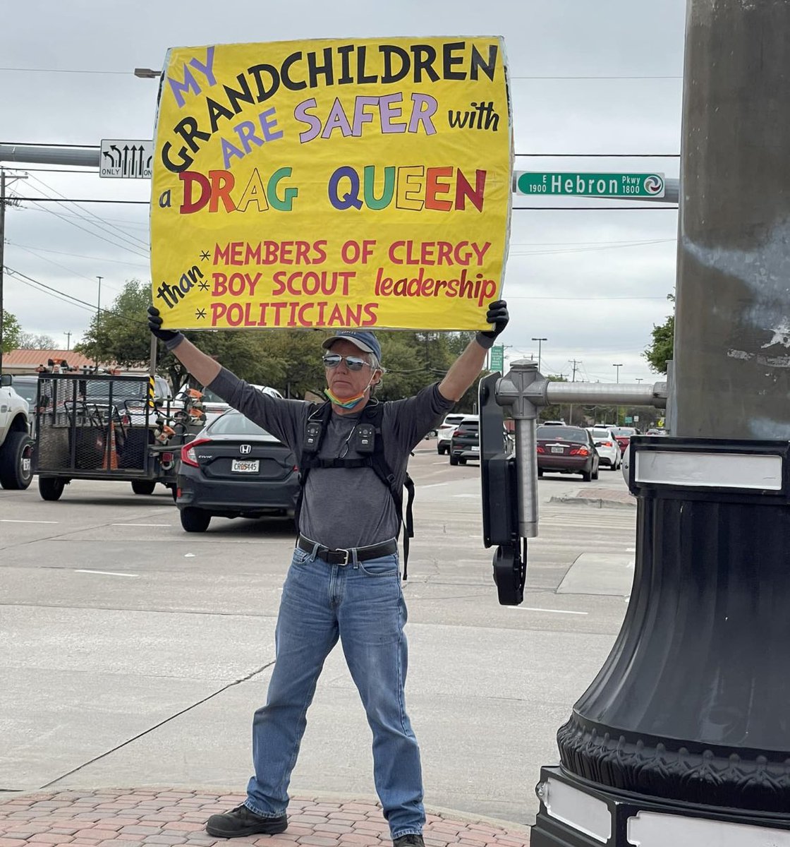 This man in Texas holding up a sign is going viral and I hope the local news finds him and gives him the airtime he deserves