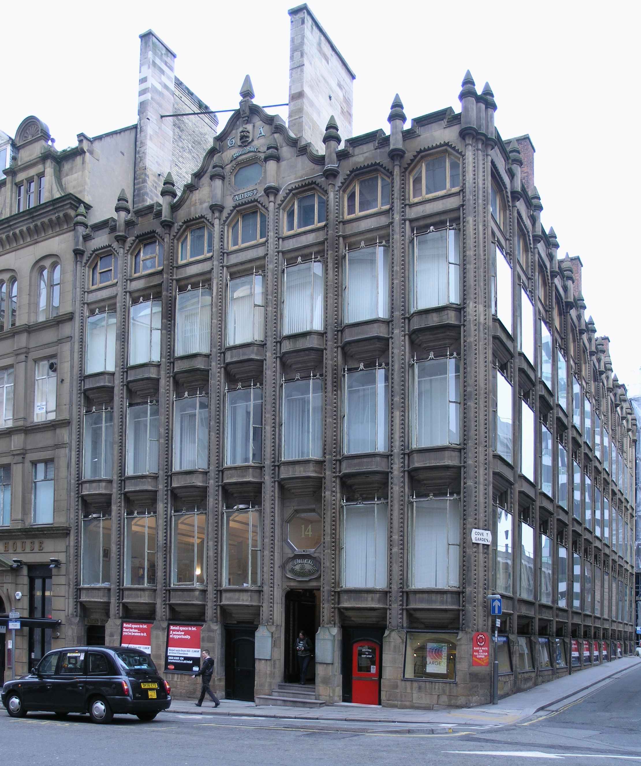 The combination of a metal frame and glass curtain wall had been around for a few decades already, a