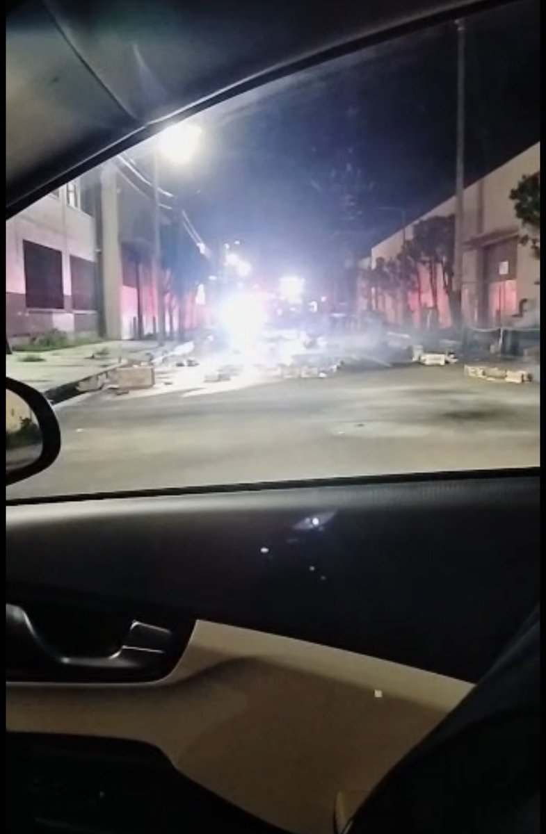 DesiBRichardson's tweet photo. Investigation update: Inglewood fireworks. BOXES of fireworks were ON FIRE 🔥 in the middle of the street. Possibly pulled out from the nearby warehouse not clear 🤷🏽‍♀️ https://t.co/ZY5cE6rwOR