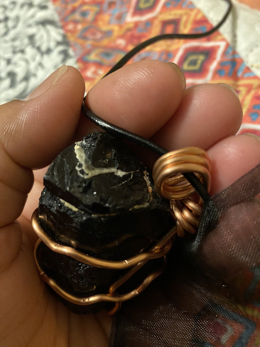 thesugaplummgod's tweet photo. My first wrapped Tesla coiled charged ✨crystal pendant✨🙌🏾🙌🏾🙌🏾 I’ll be personally delivering this chunky hunk of black tourmaline 🖤✨⚡️✨🖤No turning back now😳🫣🫢😅🚀#theyomicrystal #AbayomiTheGoddess #yomithegoddess #yomigod #crystalgoddess #goddessgrowthenergy https://t.co/GRJRXomY5K