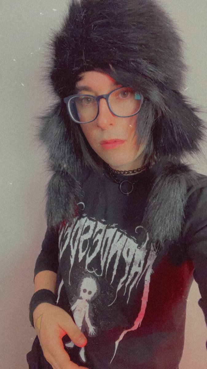 Where does the hair end and the hat begin ?