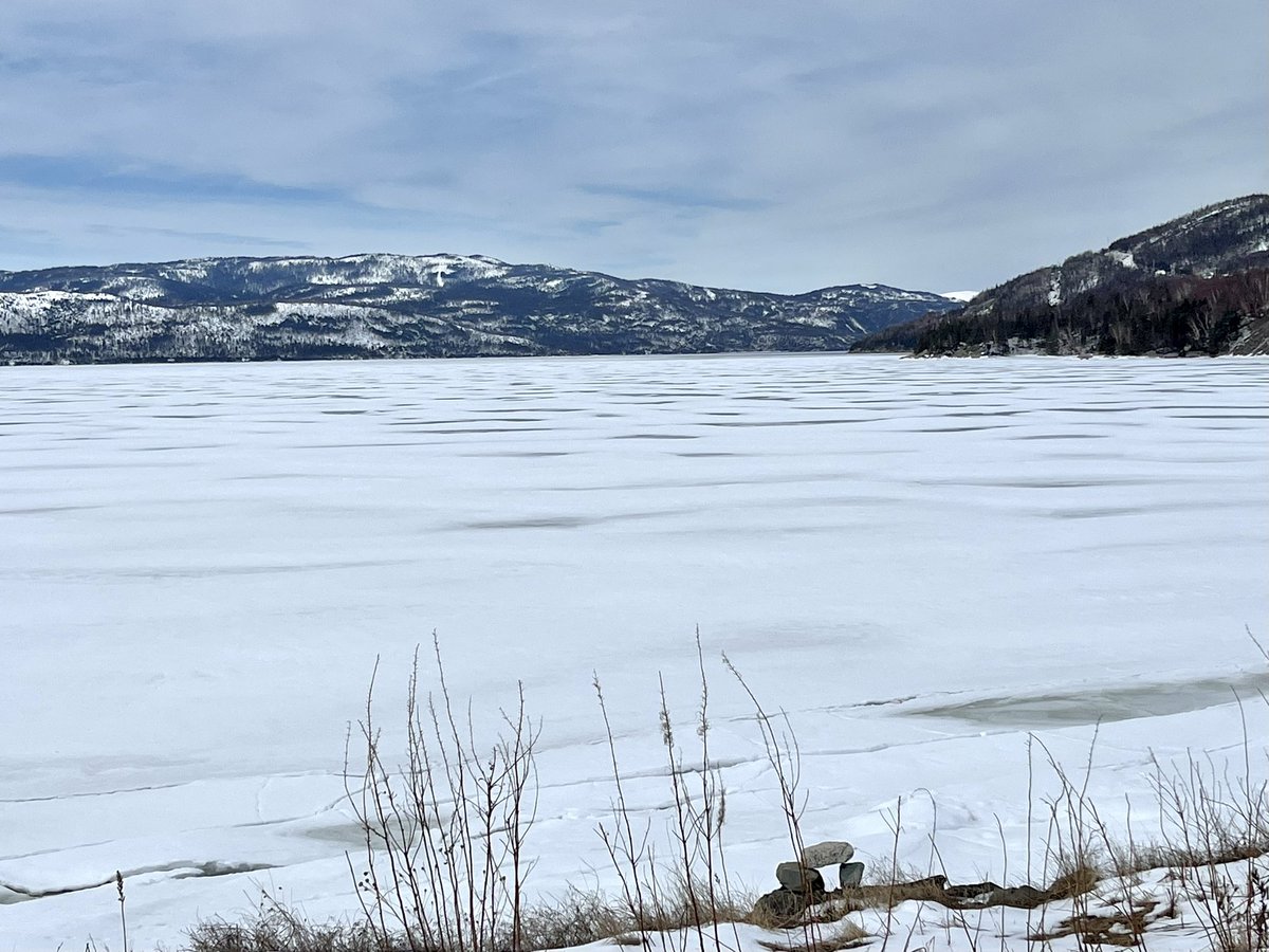 Bonne Bay is still filled with ice and the snow is just beginning to
