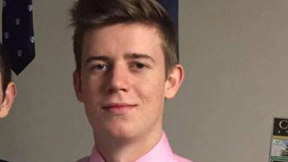 Paparoa3's tweet photo. REVEALED: The Neo-Nazi that held an Irish flag who was part of the Nazi skull mask contingent at Saturday's event in Tāmaki Makaurau by  British far-right transphobe is Christchurch traditionalist Catholic Neo-Nazi Sam Brittenden. https://t.co/SksE2wWejO