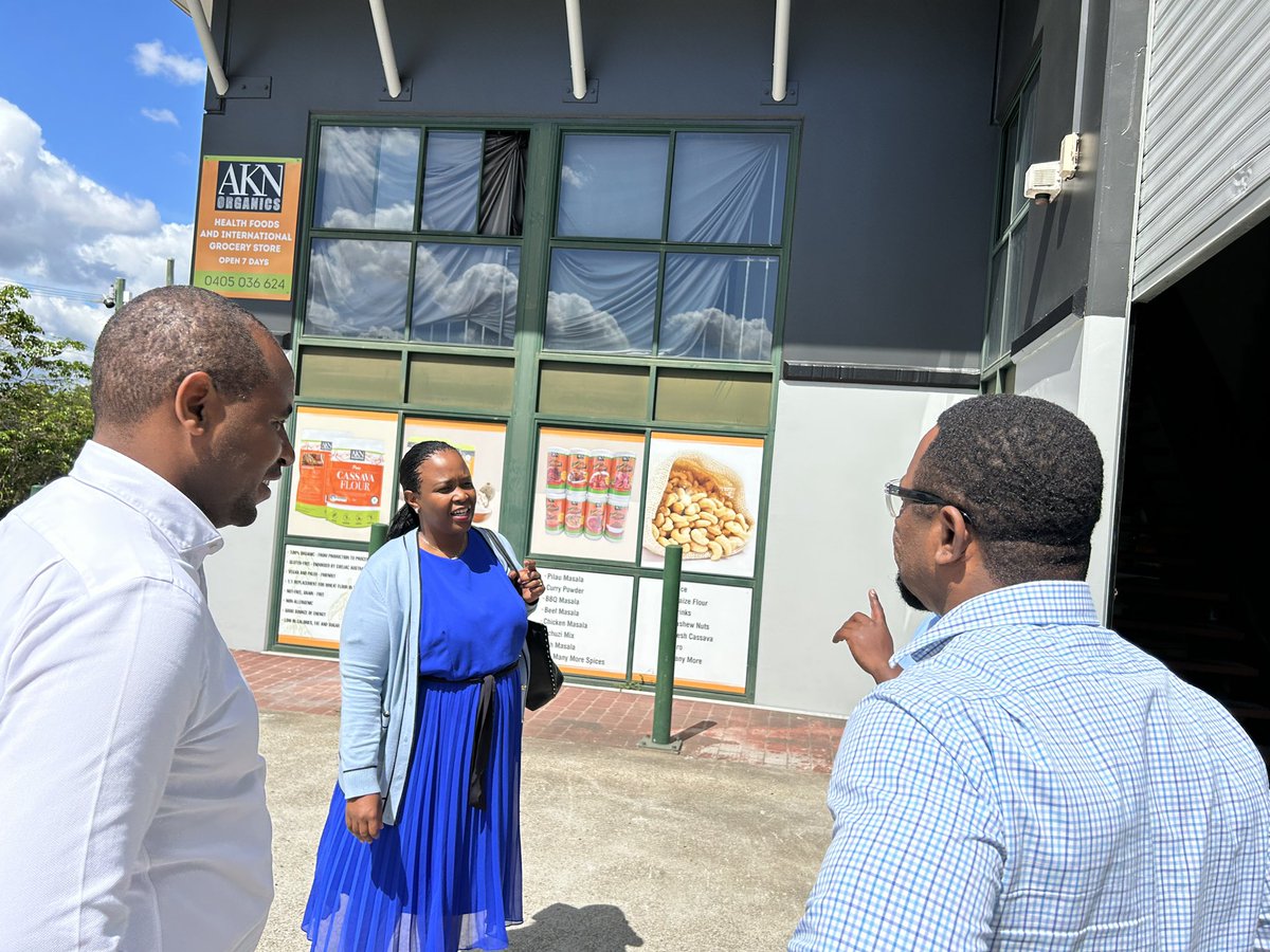 RDBrwanda's tweet photo. The Rwandan High Commissioner to Australia, H.E @Jadouwihanganye and RDB CEO, @cakamanzi visited AKN Organics, a supplier of #MadeInRwanda products including @KinaziLtd cassava flour, coffee and @AIFRwanda in Brisbane. 

They explored ways to increase volume of the goods traded. https://t.co/bVSPahHTJJ