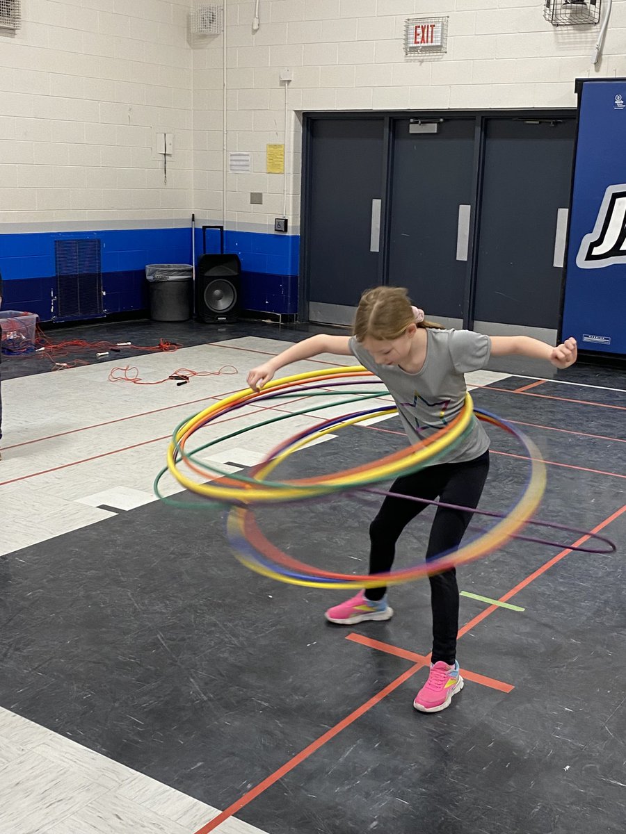 GRivett99's tweet photo. Gr 4 Stations today in gym class! 🙂🙂one Jaguar with 9 hula hoops!!  Wow!! 😱😎⁦@EIMJaguars⁩ https://t.co/vsDH314qD7