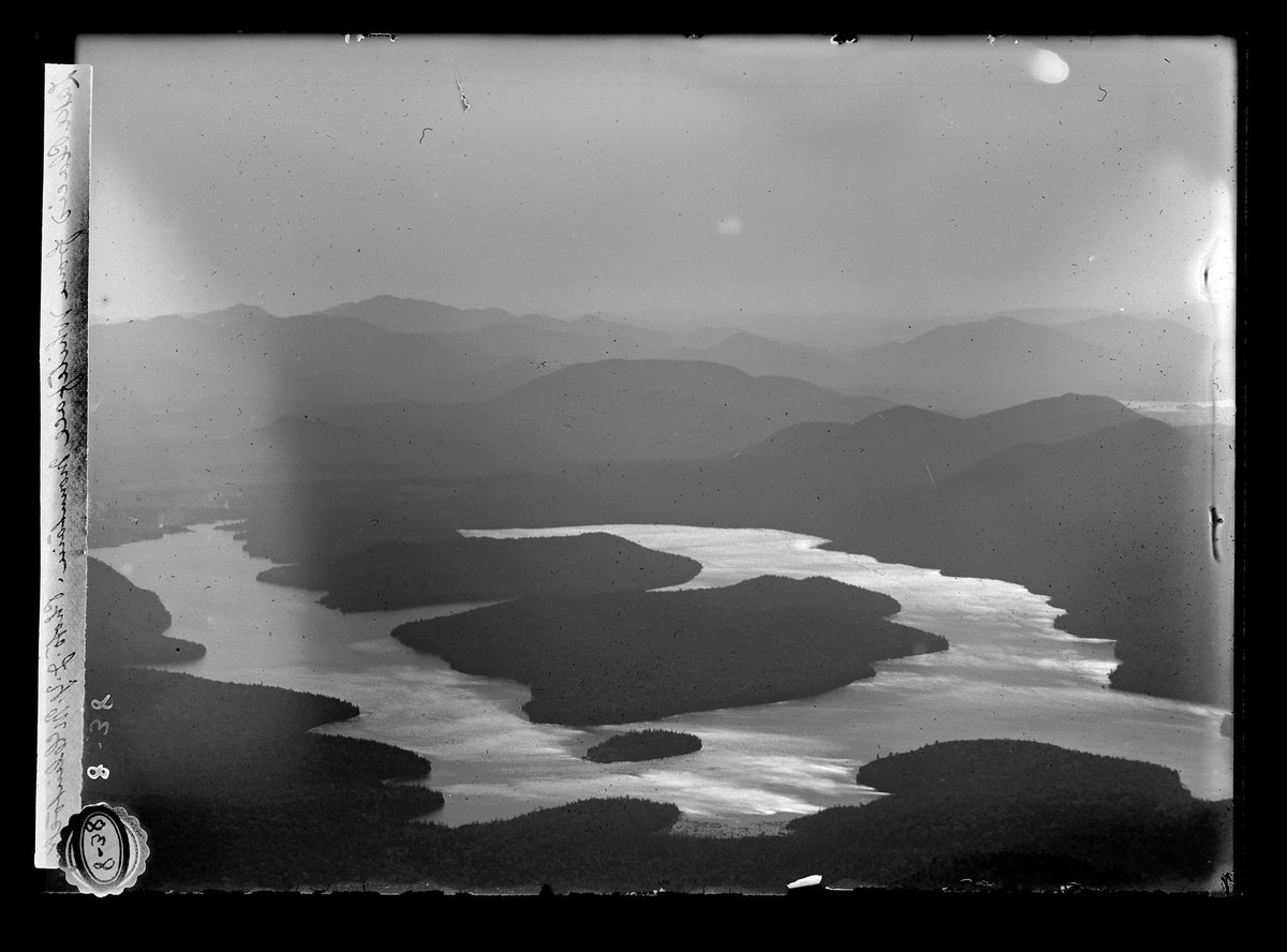 adkmountainnews's tweet photo. Yesterday, we featured images of the summit of Whiteface from the 1920s. This morning, we turn the camera outward. Check out this remarkable image from the early 20th century from the summit looking toward Lake Placid. #Adirondacks https://t.co/A6Yct7nKDz