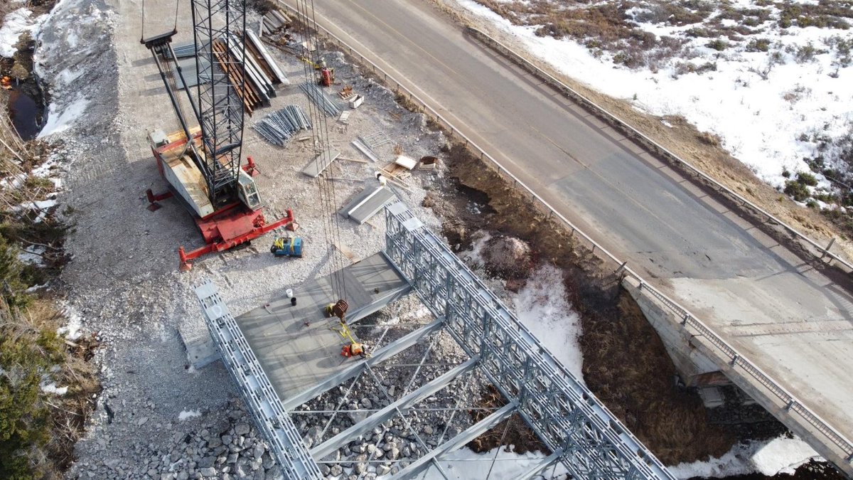 The detour at Western Brook Bridge construction site is now open. The detour will have a gravel-riding surface until asphalt becomes available in the next few weeks.