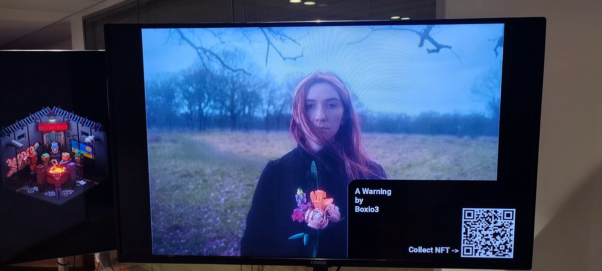 How cool is it to see "A Warning" being exhibited? Especially next to the super talented <a href="/alteredgenie/">Alteredgenie</a> ❤️ 

Big thanks again to everyone involved ❤️ 
<a href="/TezosIAC/">TIAC</a>
<a href="/IndiaTezos/">Tezos India</a>
<a href="/tezos/">Tezos</a>
<a href="/BeFantasticin/">BeFantastic</a>
#FutureFantastic 
#TezosNFTGallery