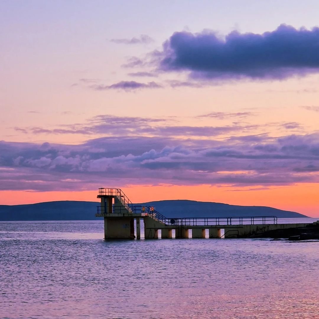 visit_galway's tweet photo. The iconic Blackrock Diving Tower to a dramatic backdrop... Have you took the plunge off the diving board yet? 🏊🌅😍❤️

📸 IG/ breathing_eire
📍 Salthill, Galway

#Iconic #DivingTower #ThatView #SeaSwimming #AmazingPlaces #SalthillProm #Salthill #Galway #Ireland #VisitGalway https://t.co/LxnhP7sVCJ