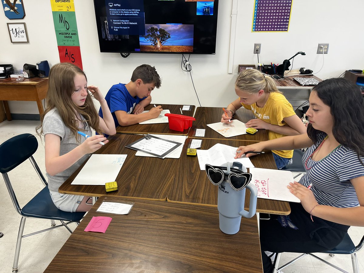 Lots of excitement in math today playing Trashketball with solving equations!