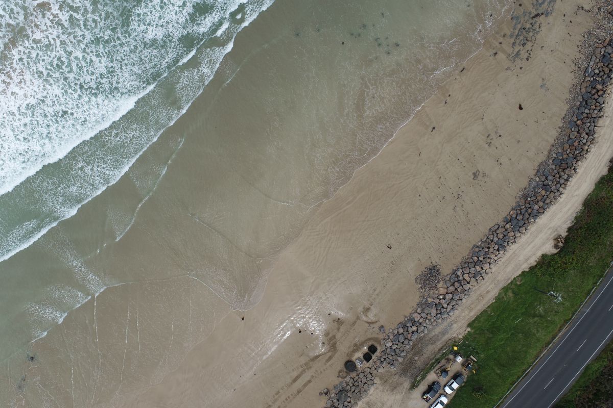 DEECA_Vic's tweet photo. The $2 million #EasternView coastal protection works are complete 🏖️  
The works included constructing a section of rock revetements, and rock bag protection for car parks and power poles to help protect the foreshore and #GreatOceanRoad from further coastal erosion. https://t.co/Er0ehUOqyL