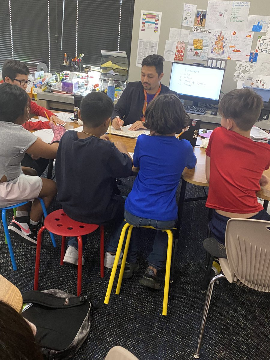 Mr. Perez’s 4th graders are working hard to write essays about what they read. First, they orally rehearsed how to restate and answer a question. @KISDMcElwain