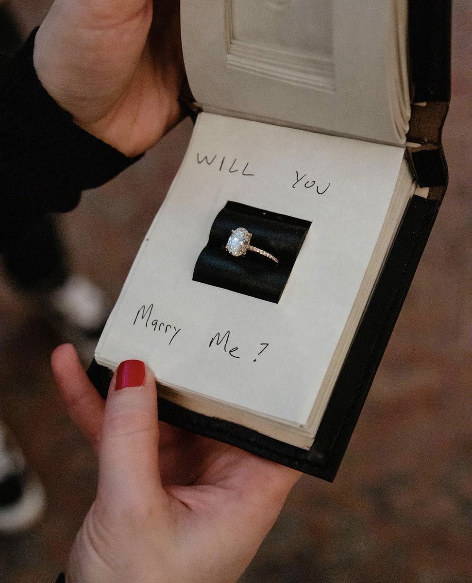 strandbookstore's tweet photo. 💍 She said yes! ✨ We love a surprise proposal! Congrats @itswristmas I bet that’s a book you’ll keep on the shelf for years to come…😊 https://t.co/305ZvMncfR