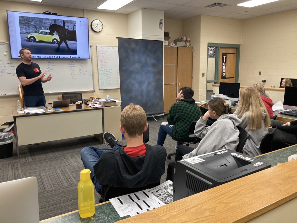 BHSNewsRoom's tweet photo. A big thank you to Chris Owens for coming in to speak with the Publications class today. Chris, a Bluffton graduate, is the Manager of Photo Operations with Indy Car. He shared his path as a photographer, which started at BHS, as well as tips to capture standout shots. https://t.co/QUFuIu7NMK