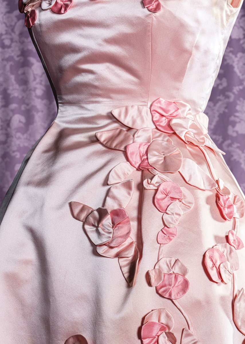 LaurenCDeutsch's tweet photo. Today's #ootd featuring #CherryBlossompink is this 1962 Ann Lowe evening dress. Silk rose rosettes begin from the shoulders and top of the bodice and come cascading the down from the waist all along the skirt. Gorgeous! @metmuseum #fashionhistory https://t.co/yAmKjw9G8s