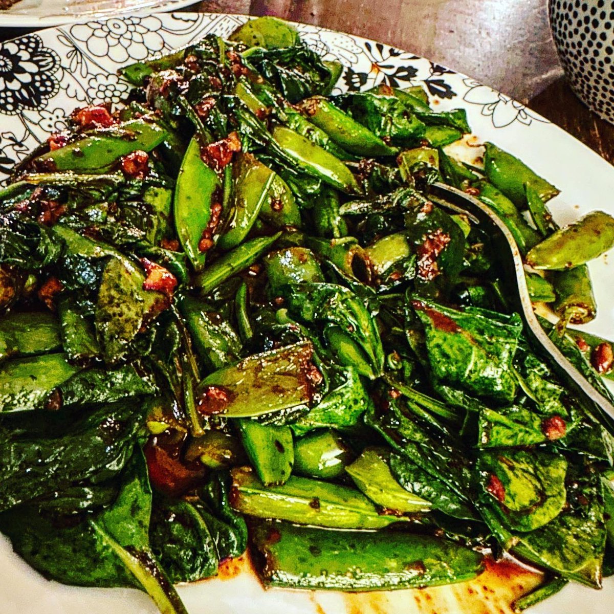 My new favorite meal. #kimchiramen #kimchi #ramen with #sirloin and the best ever side of spinach and sugar snap peas cooked with #redchiliflakes #gochujang and #garliqué paired with some #soju #chumchurum it’s so spicy and so good!!!!