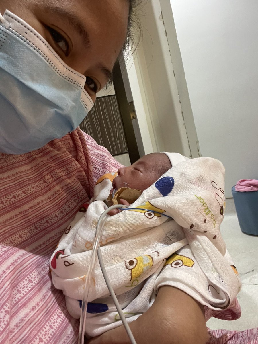 docdesire_E's tweet photo. First time carrying my baby love 6 days post-partum and OMG my heart. 🥹 I already know I will do anything for this little angel. 😭🥰 https://t.co/VGwjG8Kh3p