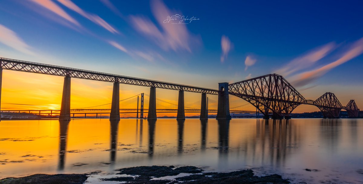 dsrjohnstone's tweet photo. "Sunset at the 3 bridges".
Spent a few hours down at South Queensferry last night. Light was pretty special. 
Spot the train in the 2nd image. https://t.co/MVvRpkA4X7