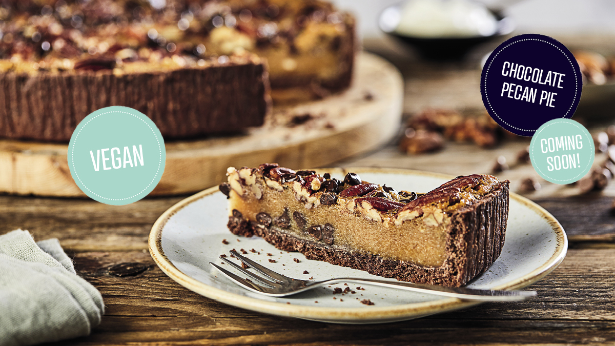 COMING SOON!! Our brand new Vegan Chocolate Pecan Pie!
A classic American favourite, our Vegan Chocolate Pecan Pie is filled with a delicious maple flavoured filling &amp; dark chocolate chips, then topped with toasted pecan nuts &amp; dark chocolate chips. Pre-portioned  into 14 slices.