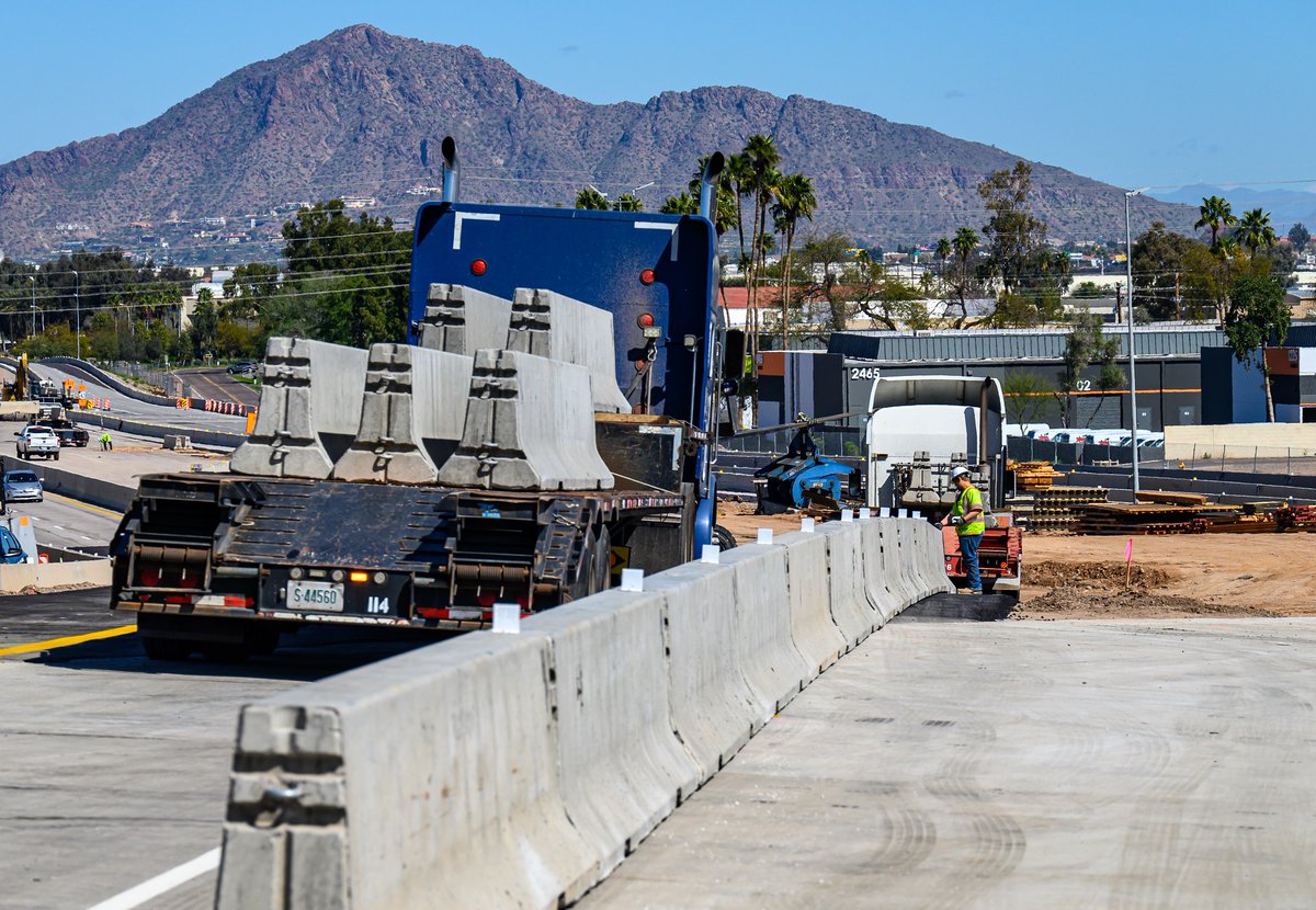 ArizonaDOT's tweet photo. Crews with the I-10 Broadway Curve Improvement Project recently arranged temporary barriers on the north side of the new NB 48th Street bridge over I-10. They glued reflectors to the top so drivers can see the barriers at night. #StayAheadOfTheCurve https://t.co/9RToV9jv5l https://t.co/iRK2OI4Fae