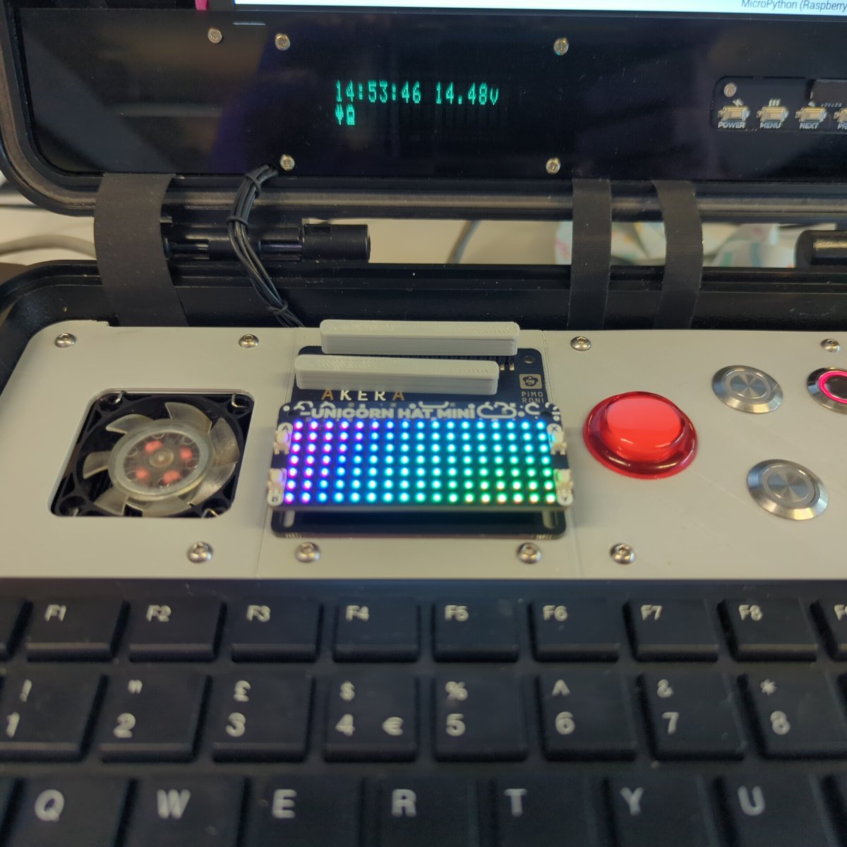 CannonFodder's tweet photo. @orionrobots @scottmonaghan @drfootleg I used them in my #CyberPiDeck build. They are great, used them because of the ribbon cable. The two thin ribbons to the right are them one is HDMI and the other is usb powering the screen, the larger one in the left is just a Pi Camera cable covered in cable harness tape. https://t.co/kh2sihlA4B