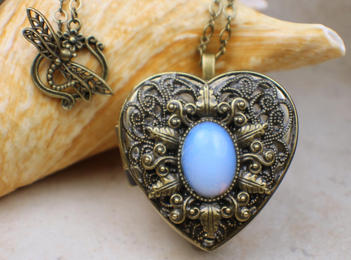 charsfavorite's tweet photo. White Opal Quartz Music Box Locket, Music Box Necklace, Mini Music Box, Musical Pendant, Music Box Jewelry https://t.co/XKN6y0v8ia #Charsfavoritethings #Etsy #TinyMusicBox https://t.co/fsUOBQU1YT