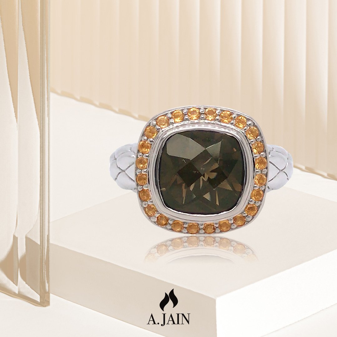 This Smokey quartz with a citrine ring, from A.Jain's Timeless collection, derives its charm from beauty and perfection. The beauty of everlasting love and the perfection of our gemstones! #ajainjewelry #haloring #timelessjewelry #lifestylejewelry #nycstyle #madeinusa