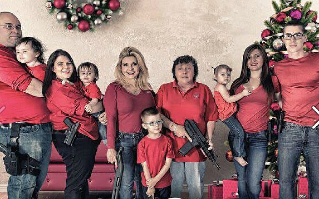 It's a sick sob that has their children pose with weapons of war in the age of school shootings. 
