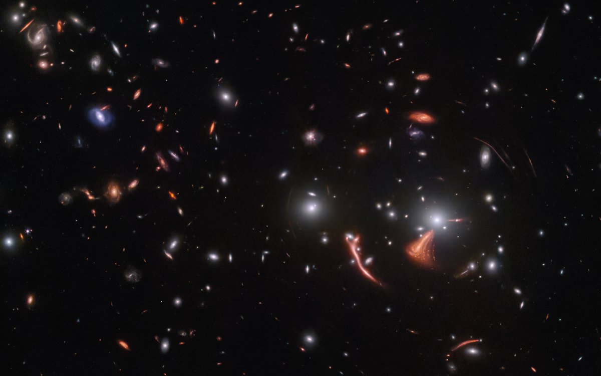 Warped tour…of space? ✨

See those strange arcs and streaks in this new Webb image? They’re actually distant galaxies, magnified and warped due to an effect called gravitational lensing: esawebb.org/images/potm230…