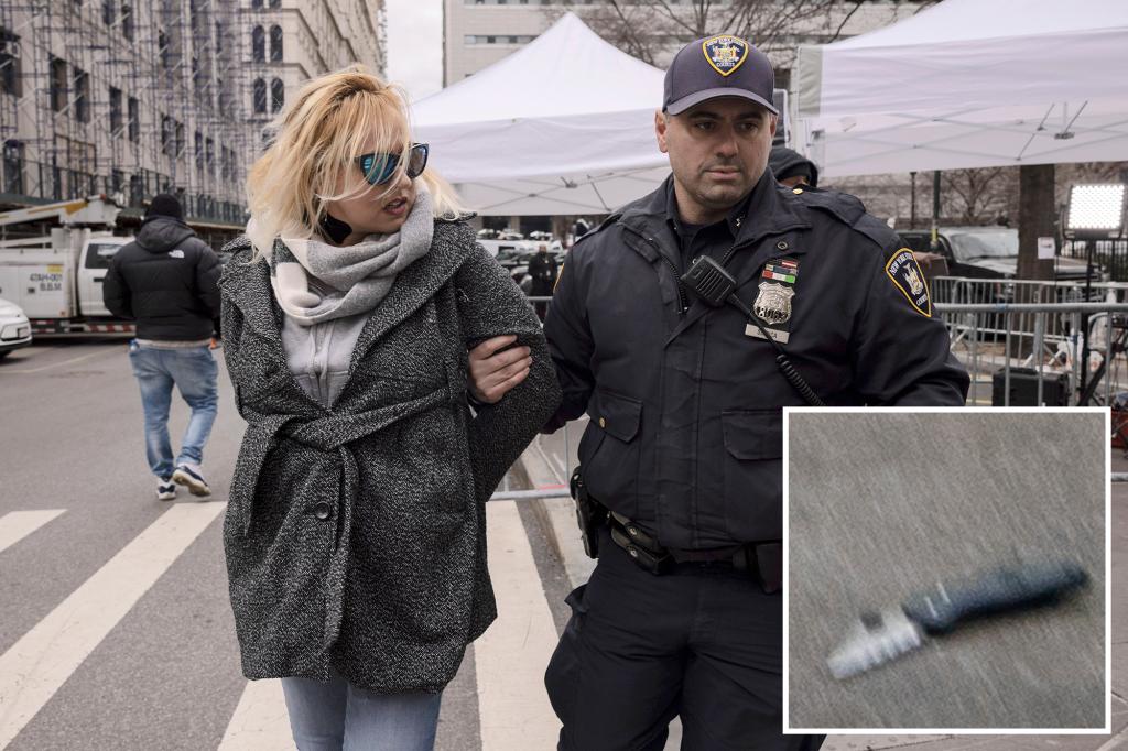 nypost's tweet photo. Knife-wielding Trump supporter taken away from NYC courthouse in cuffs https://t.co/W44WjTP8o1 https://t.co/0OQ2TBdYh2
