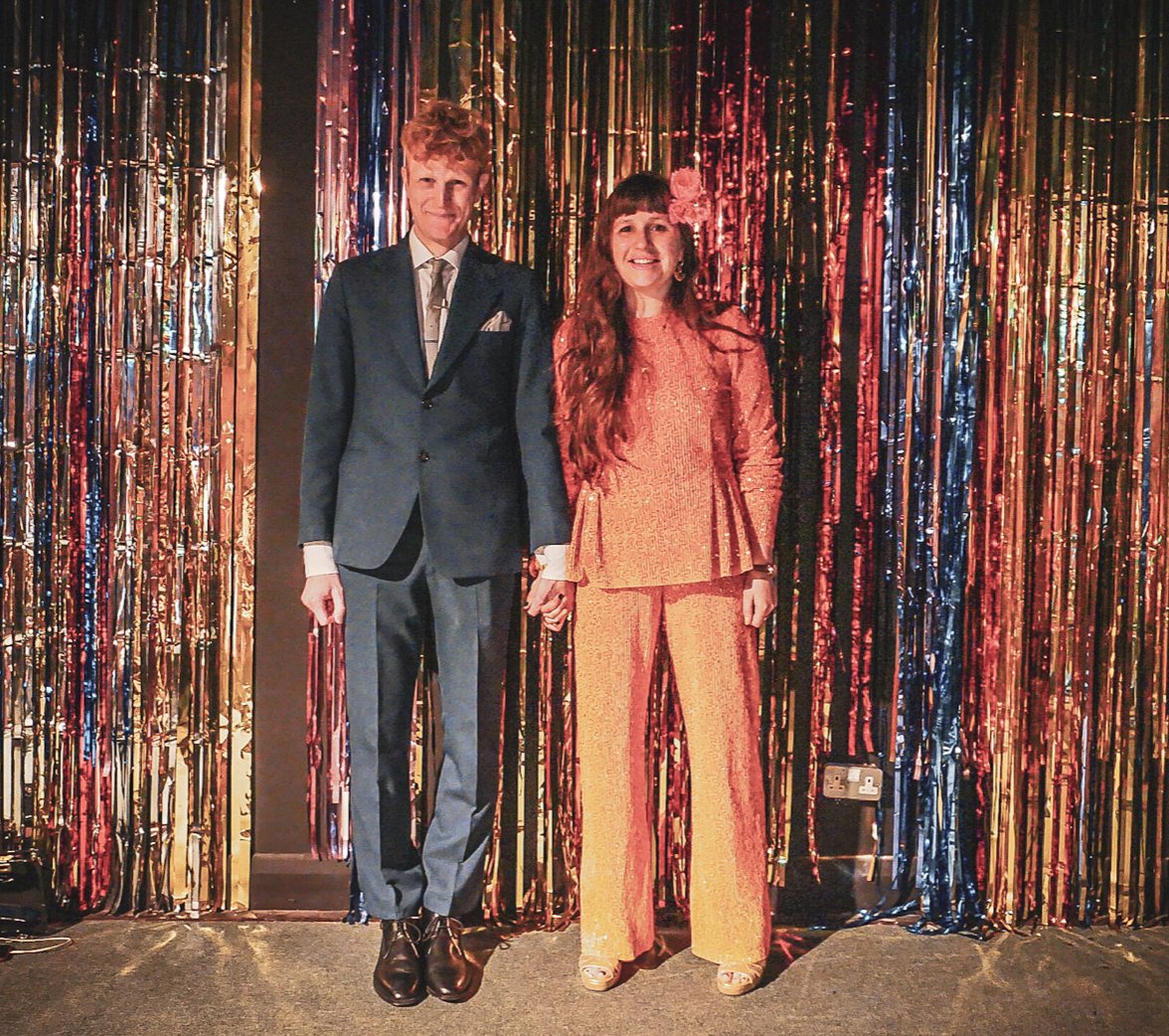 Civilly partnered to the wonderous human <a href="/georgewigzell/">George Wigzell</a> - there was ping pong, a ride on the top deck (242), football tournament, pastel de natas, raffle, quizzes, Kims Game, 160 loved ones, a steelband, ice-cream sandwiches, Nepali food, a ceilidh and an inflatable unicorn 😍