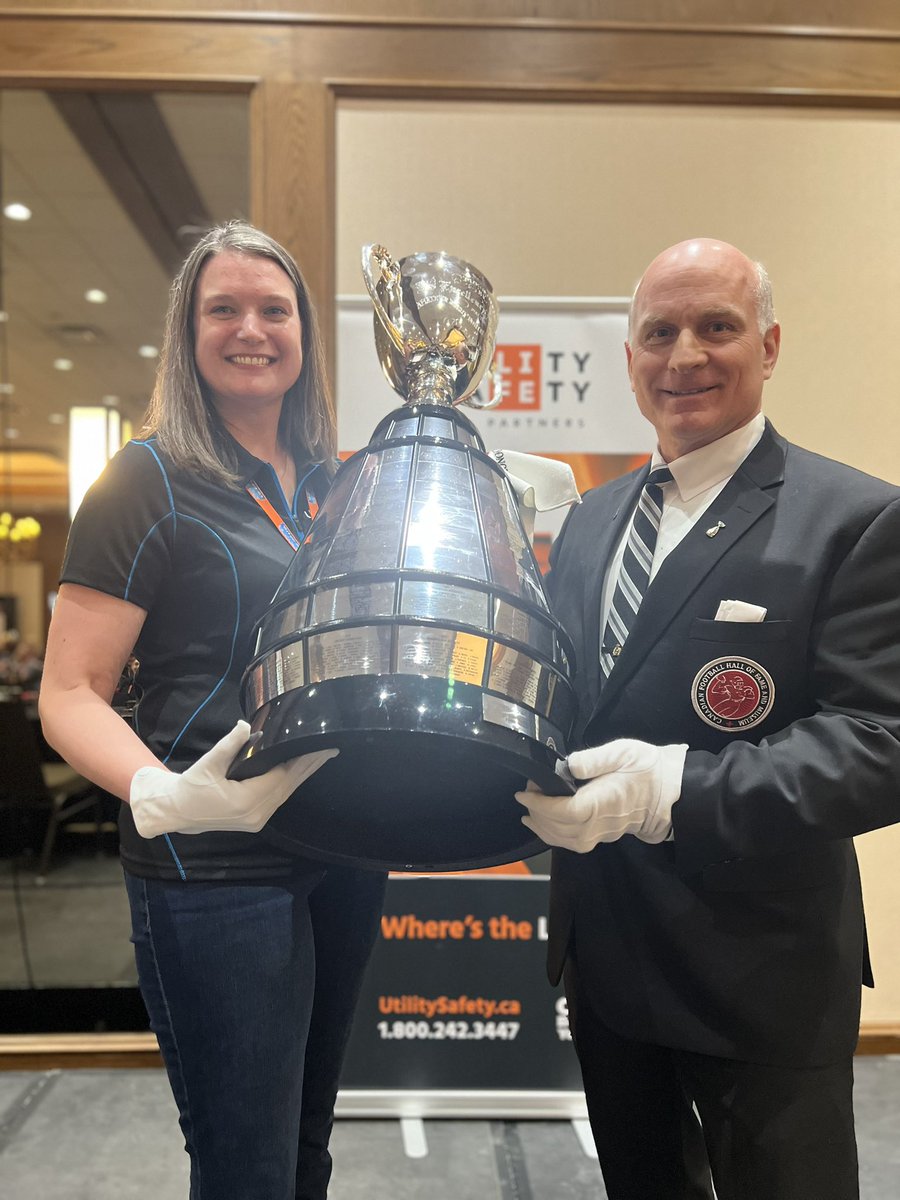 Utility_Safety's tweet photo. Utility Safety Partners’ own Kassi Zaba is bestowed with the role of Honorary Keeper of the Cup by Jeff @jeffthekeepergc McWhinney recognizing her dedication towards #USP2023 #ClickBeforeYouDig #DigSafe #WheresTheLINE https://t.co/m3roXUo2mi