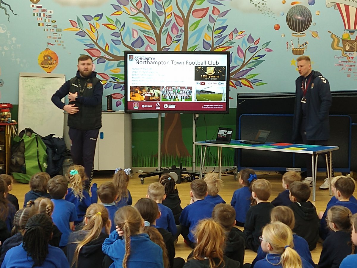 fox_damon's tweet photo. Great to be back out in schools seeing @JoeD_NTFC deliver a fantastic assembly on the history of @ntfc to start our @NTFC_CT #Takeoverday at @NewnhamPrimary #connectingcommunities #ntfc #cobblers #northamptonshire @DRETsport https://t.co/D3l9GFIGBX