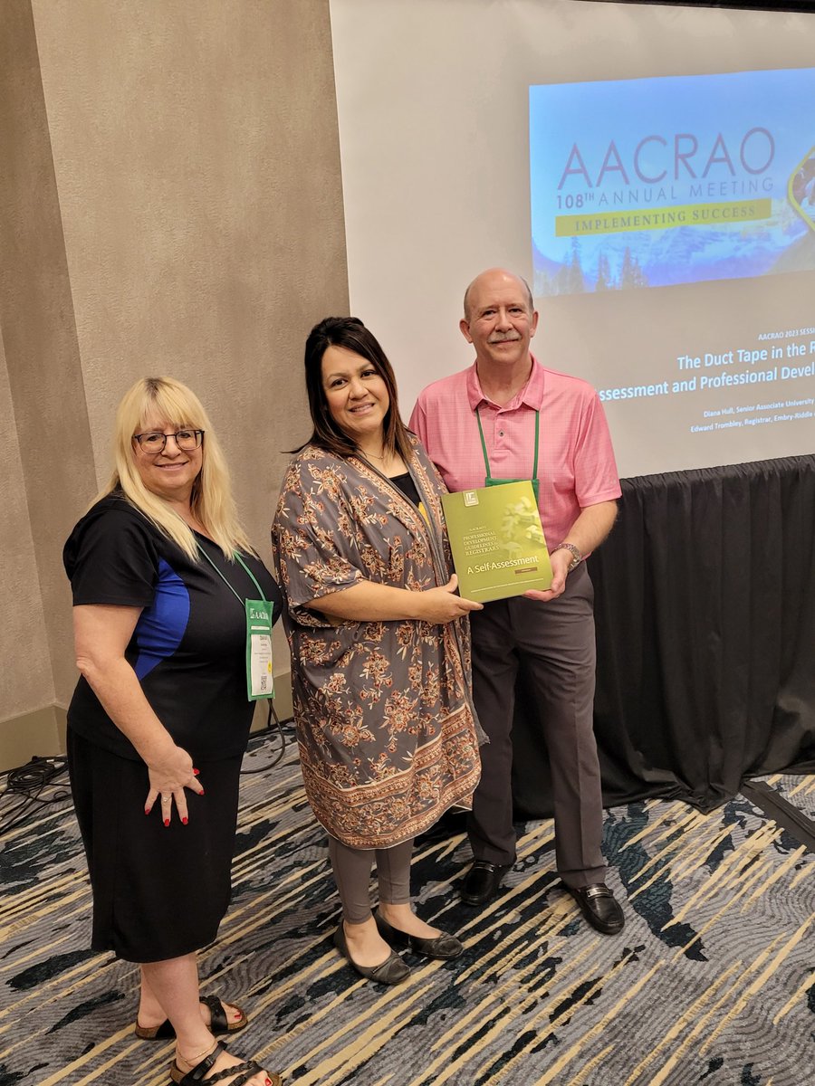Diana Hull, Sr. Assoc. Univ. Registrar at UF, &amp; Ed Trombley, Registrar at ERAU-WW, pose with Kristi Fonseca-Williams, of Texas Tech University, winner of the "AACRAO Registrar's Guide for Self-Assessment" at their session today.  Congratulations Kristi! #AACRAO2023 #aacraopubs